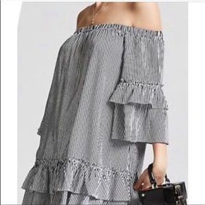 Off the shoulder black and white strip mini dress